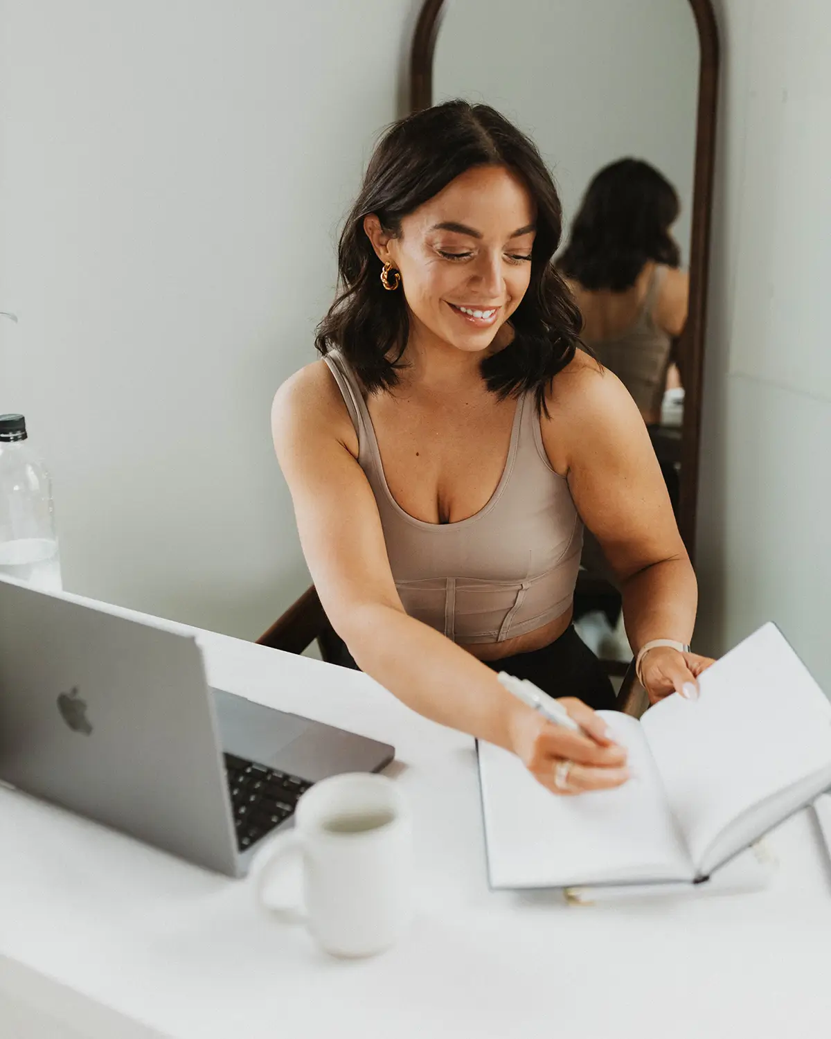Influencer Liza Marie working at a desk