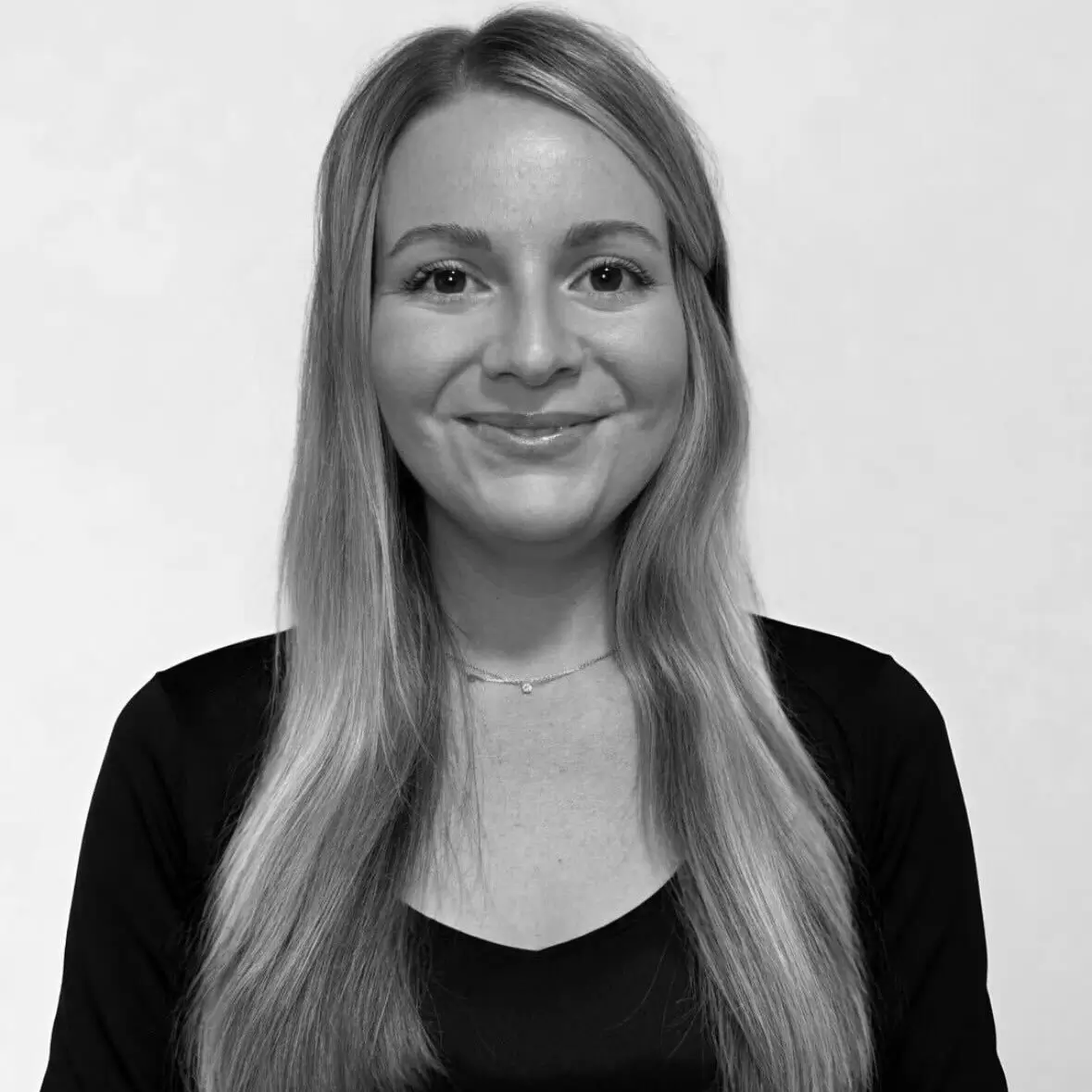 Headshot of a female assistant fitness coach named Tori